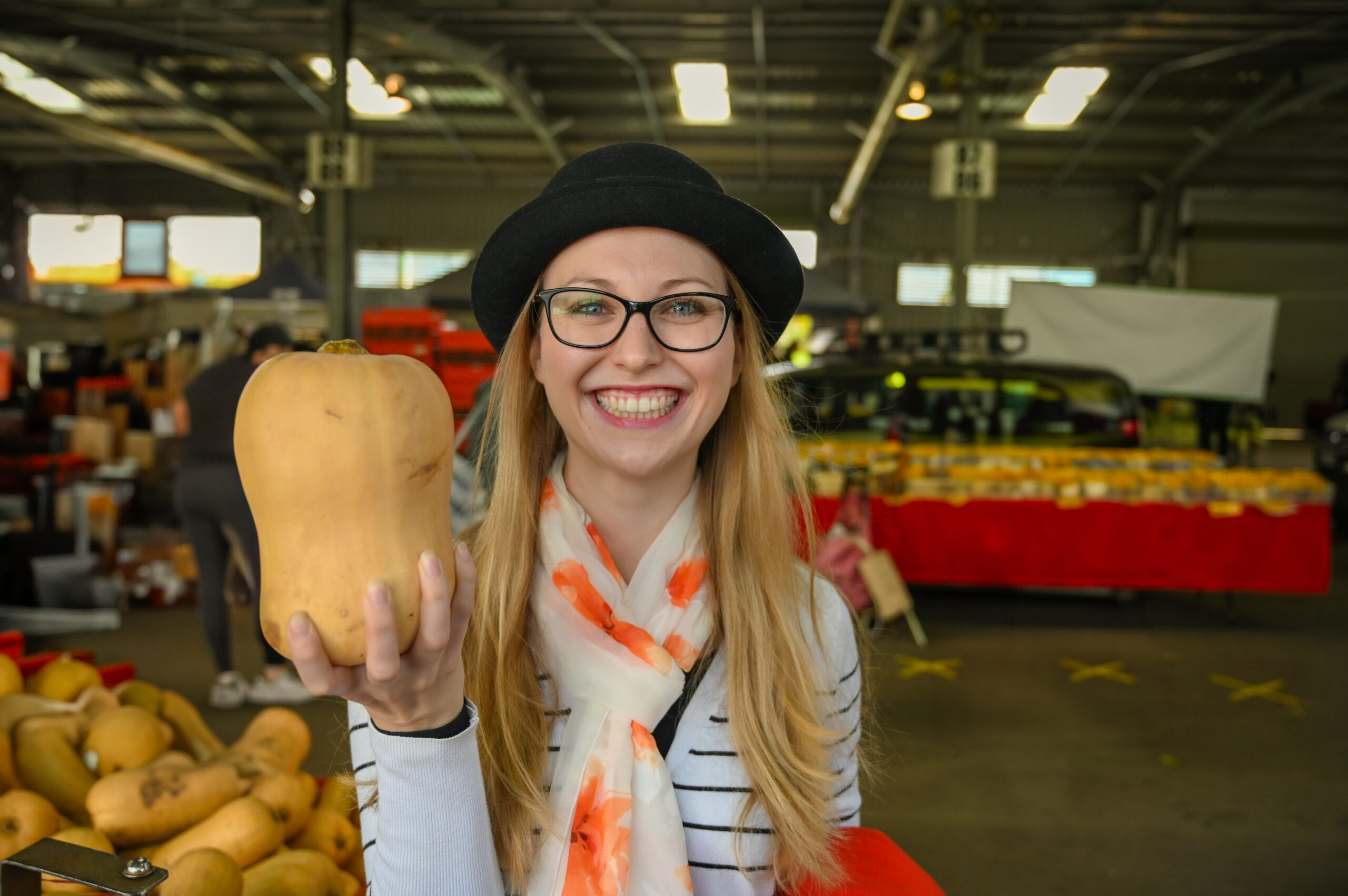 Neurodivergent Eating: How I Maintain A Healthy Relationship With Food. Holding a pumpkin smiling