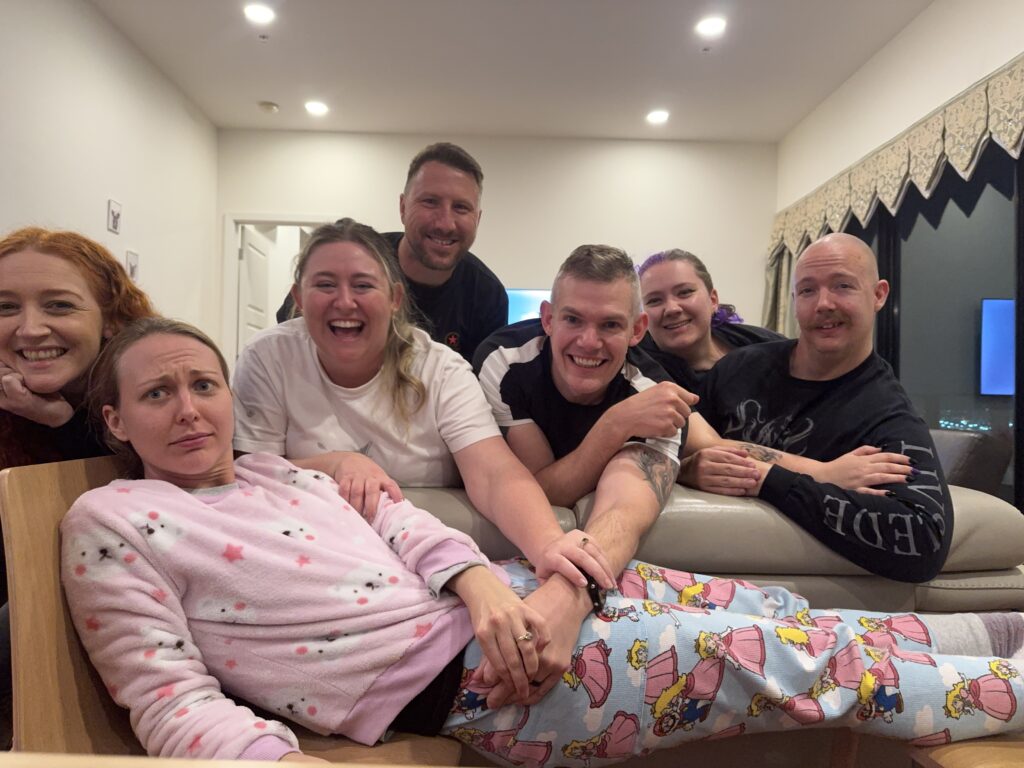 Photo of me with my friends whilst i look clearly overstimulated