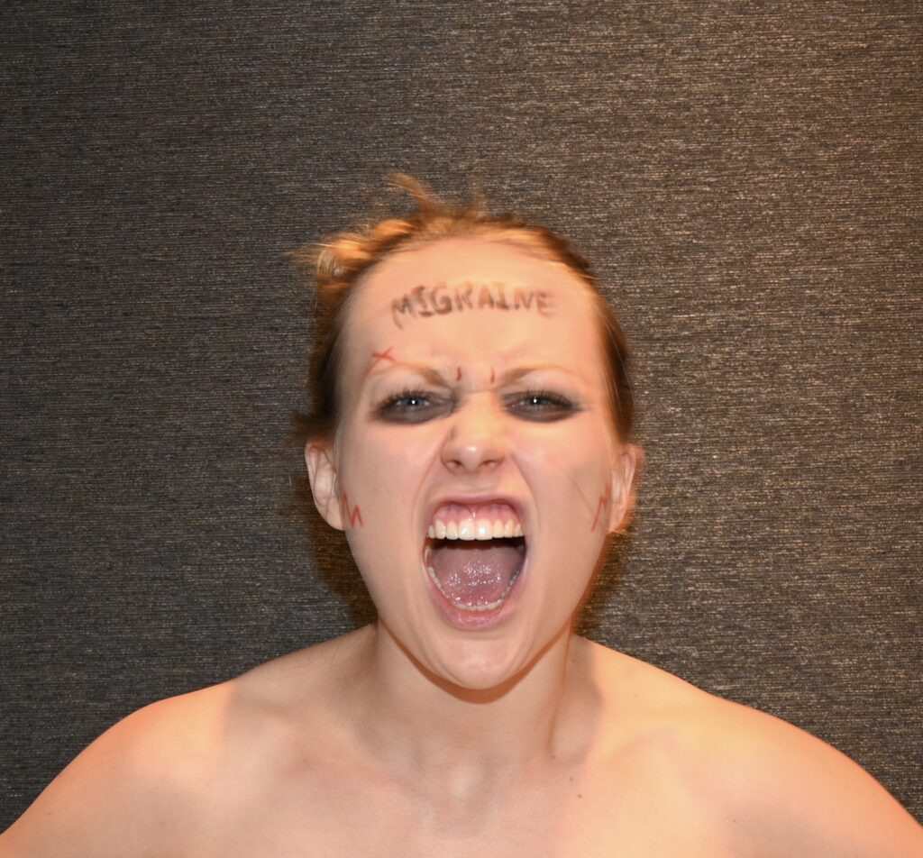 woman screaming into the camera because i am so angry that contraception made my endometriosis worse