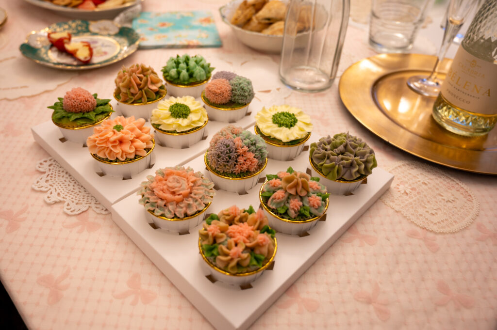 Photo of the cupcakes my mum and I decorated, showcasing our finished designs at the end of the evening.