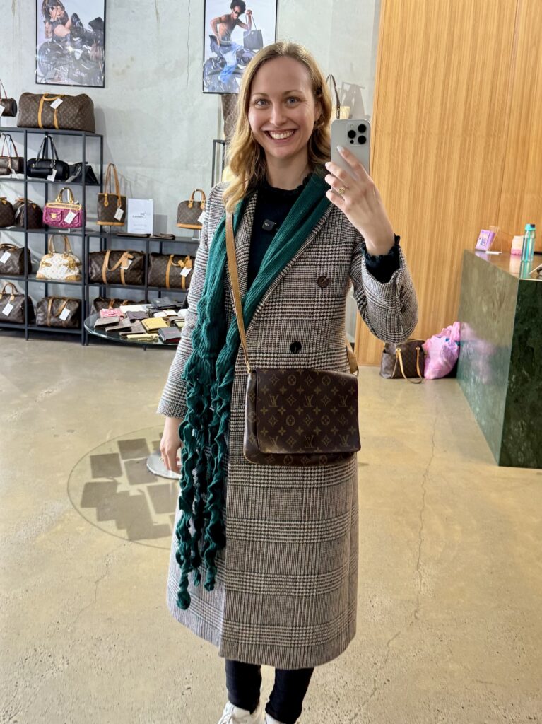 Trying on the Louis Vuitton bag in Virtual Icon Vintage Store, smiling because I had learnt how to stop overthinking decisions 